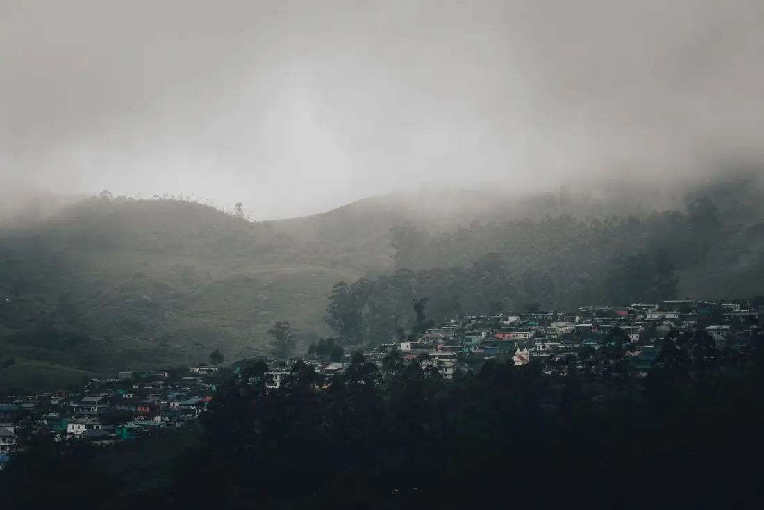 Mist rolling over the Munnar valley